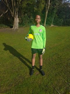 Baba is the goalkeeper for the Caterham Pumas U15 Kings team