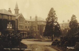 A sepia photo of St Lawrence's Hospital in Caterham